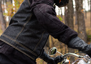 biker with helmet riding on highway